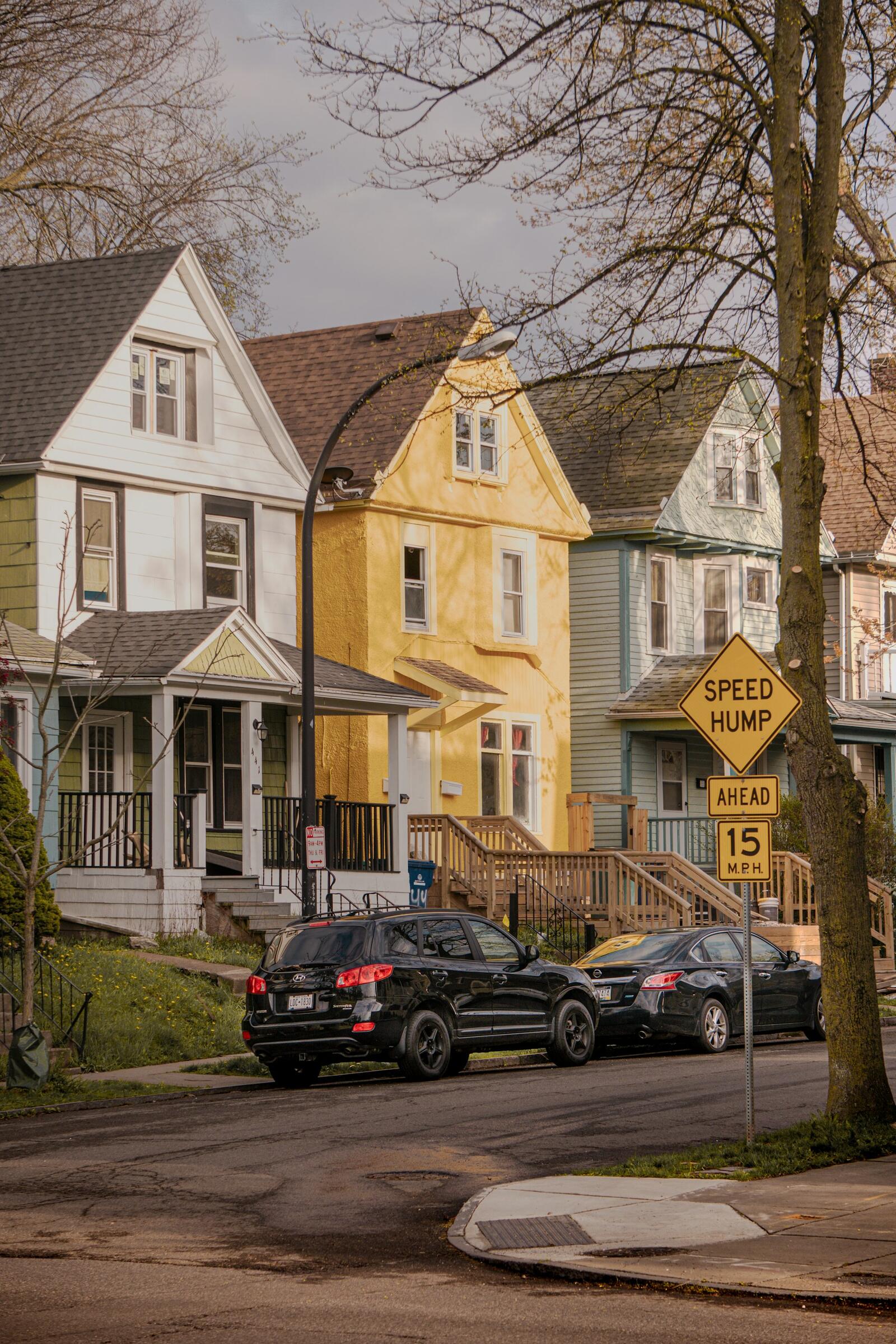 A row of well-kept houses on a residential street in Buffalo